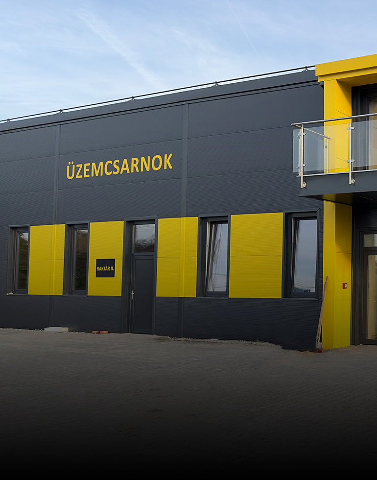 Ballószög BKMFÜ csarnoképület<br>falfelület képzése, ipari mennyiségben.